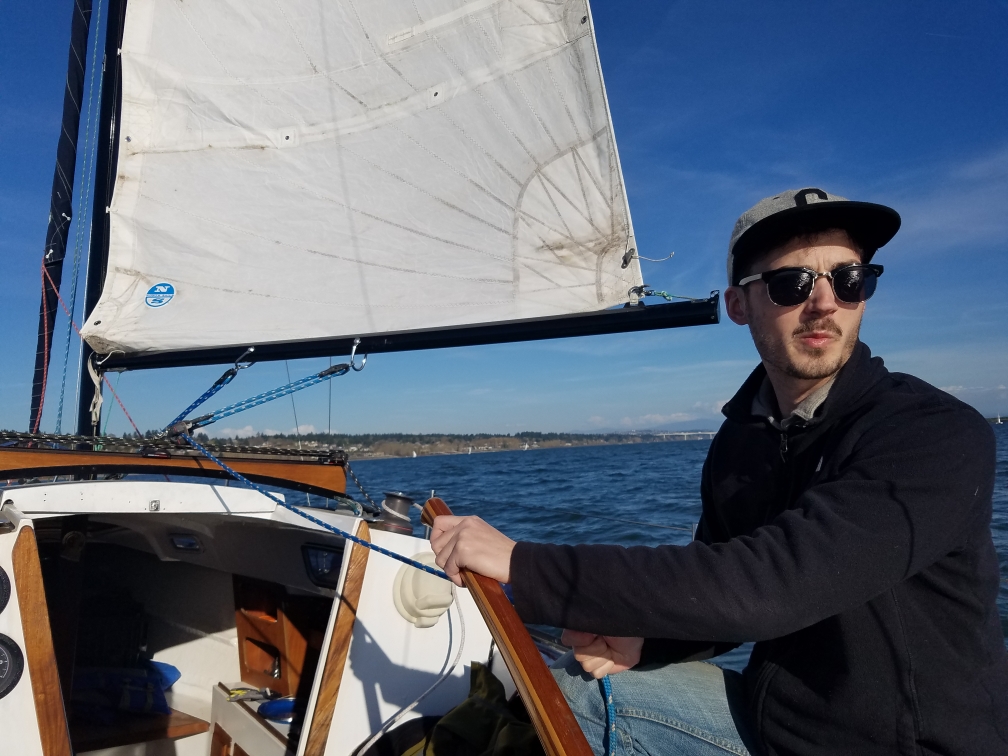 Ethan Poole sailing his boat on the Columbia River.