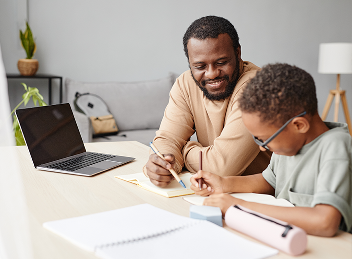 Parent helping student with school work