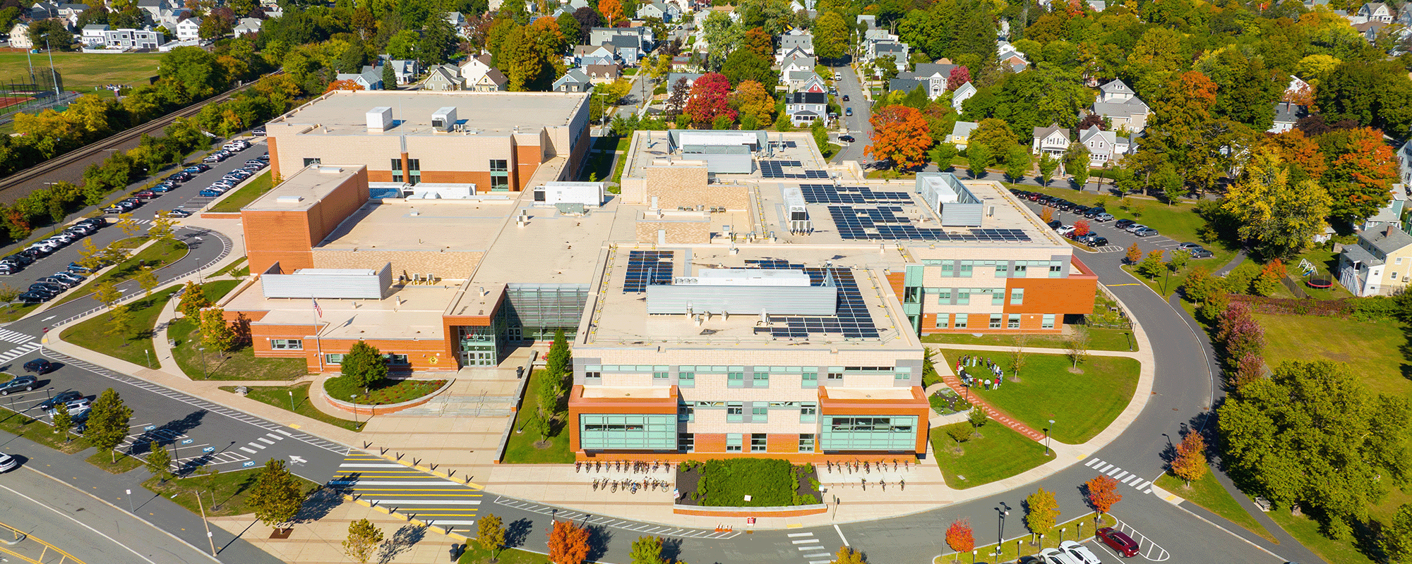 Aerial view of a high school and surrounding neighborhood