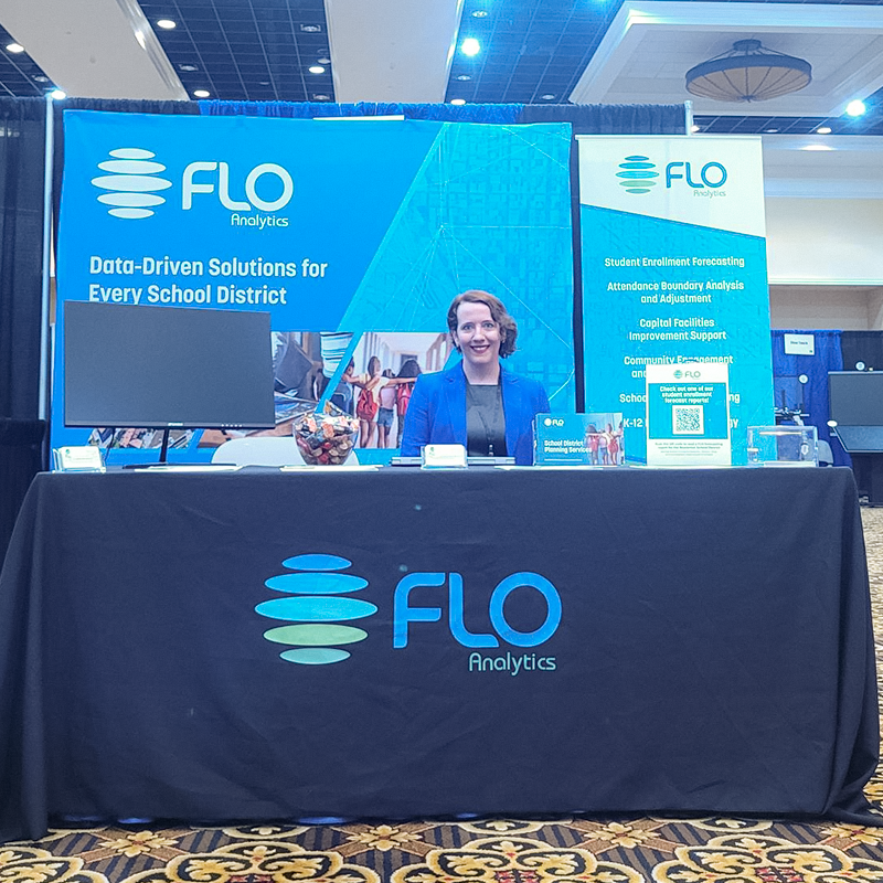 FLO employee working a conference booth