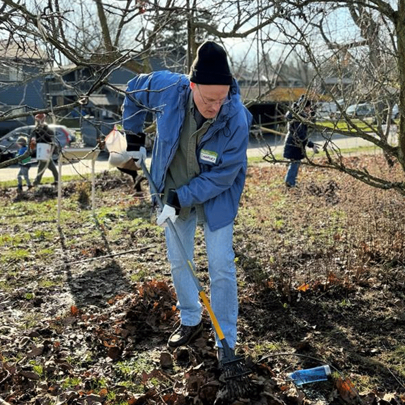 FLO Employee volunteering planting a tree