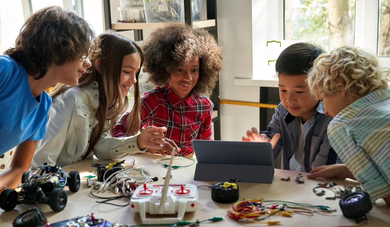 Diverse group of teens in a STEM setting