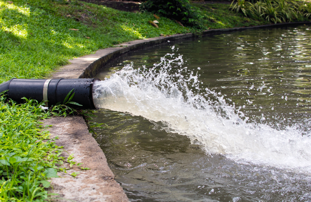 rain water coming out of a drain pipe